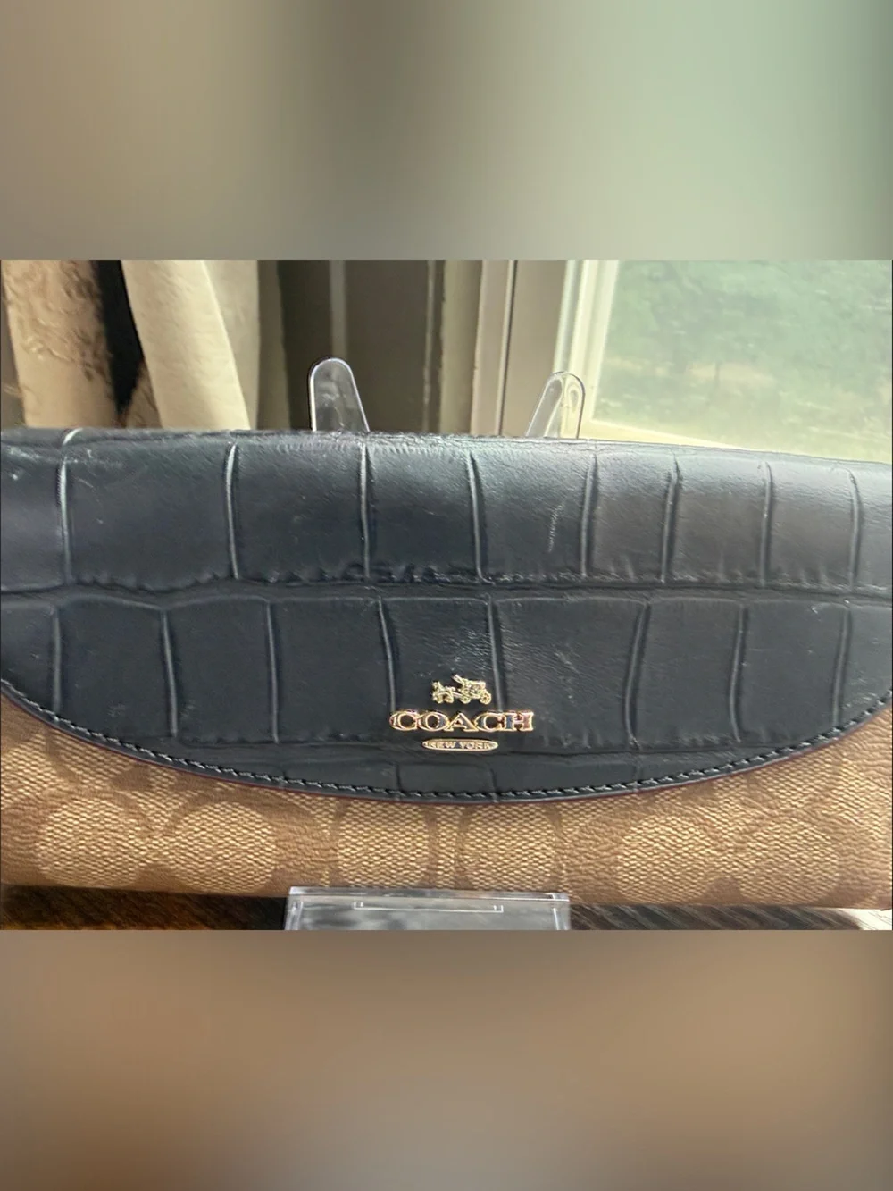 Coach iconic signature